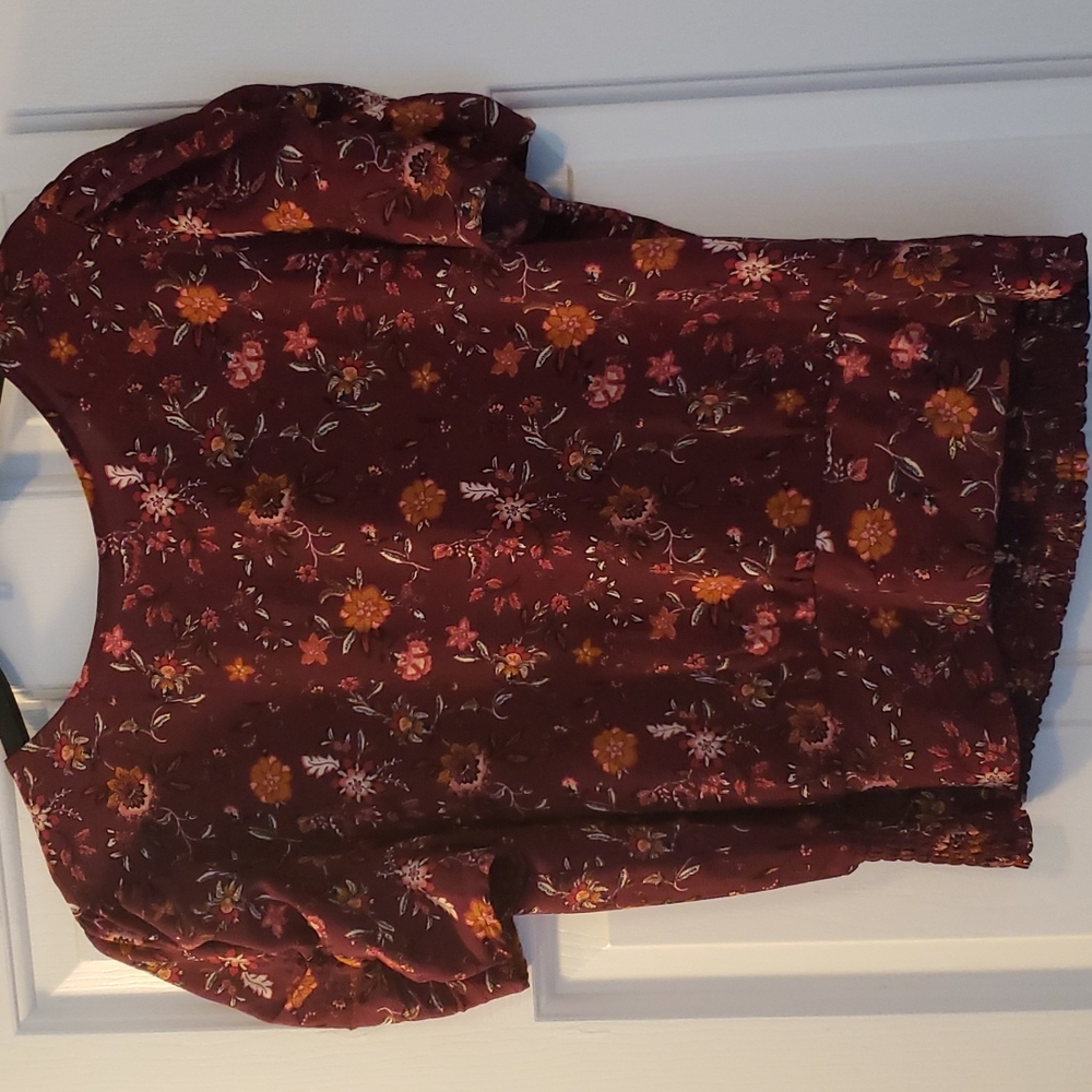 Wine paisley mid length top, size says XL but fits like an L